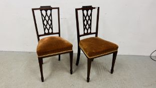 A PAIR OF LATE VICTORIAN SIDE CHAIRS INLAID LATTICE SPLATS AND UPHOLSTERED STUFF OVER SEATS.