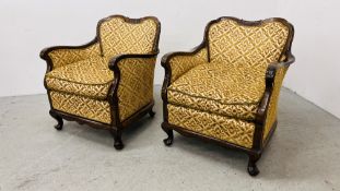 A PAIR CONTINENTAL STYLE TUB CHAIRS UPHOLSTERED WITH GOLD BROCADE MATERIAL