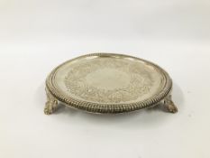 A SILVER CIRCULAR SALVER WITH NULLED RIM ON SCROLLED TRIPOD FEET BY JOESEPH WALKER OF DUBLIN C17