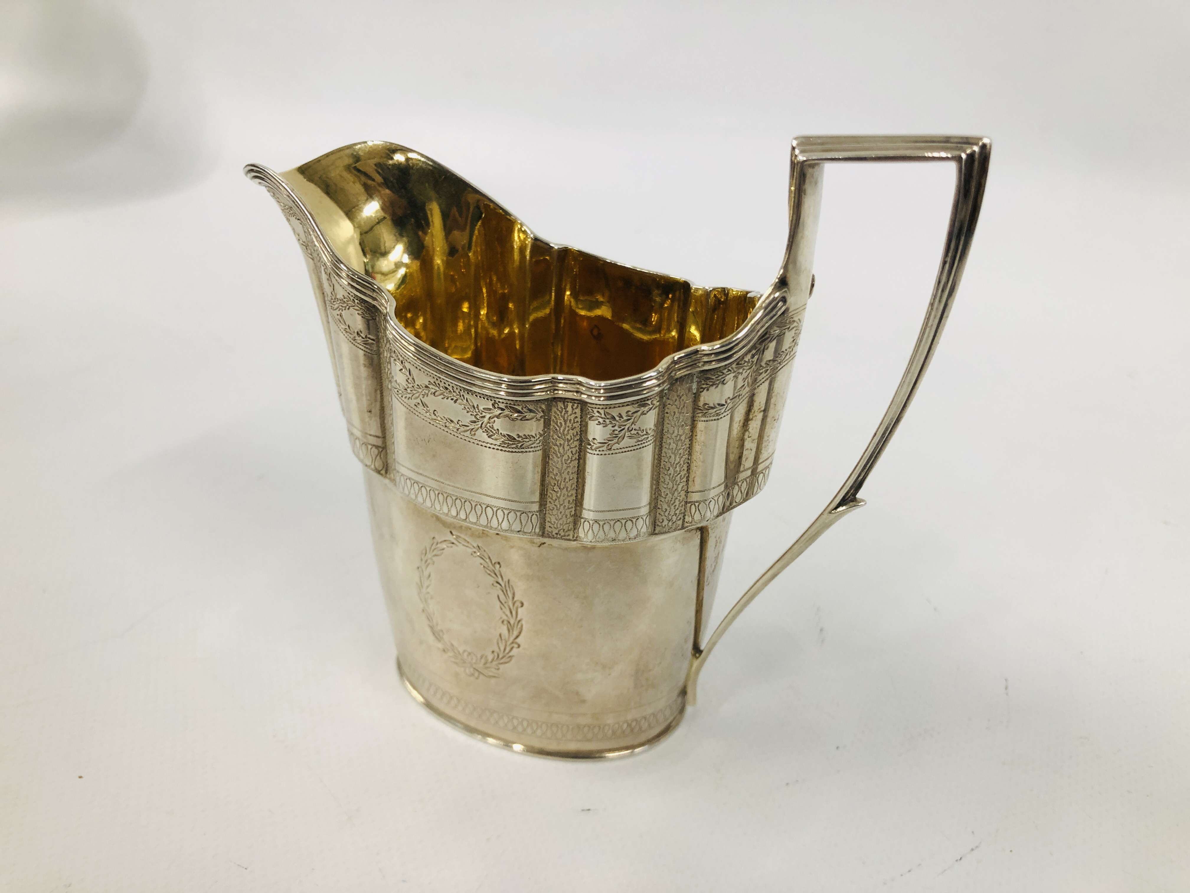 GEORGE III SILVER HELMET SHAPED MILK JUG THE BODY WITH LAUREL LEAVES, - Image 4 of 10