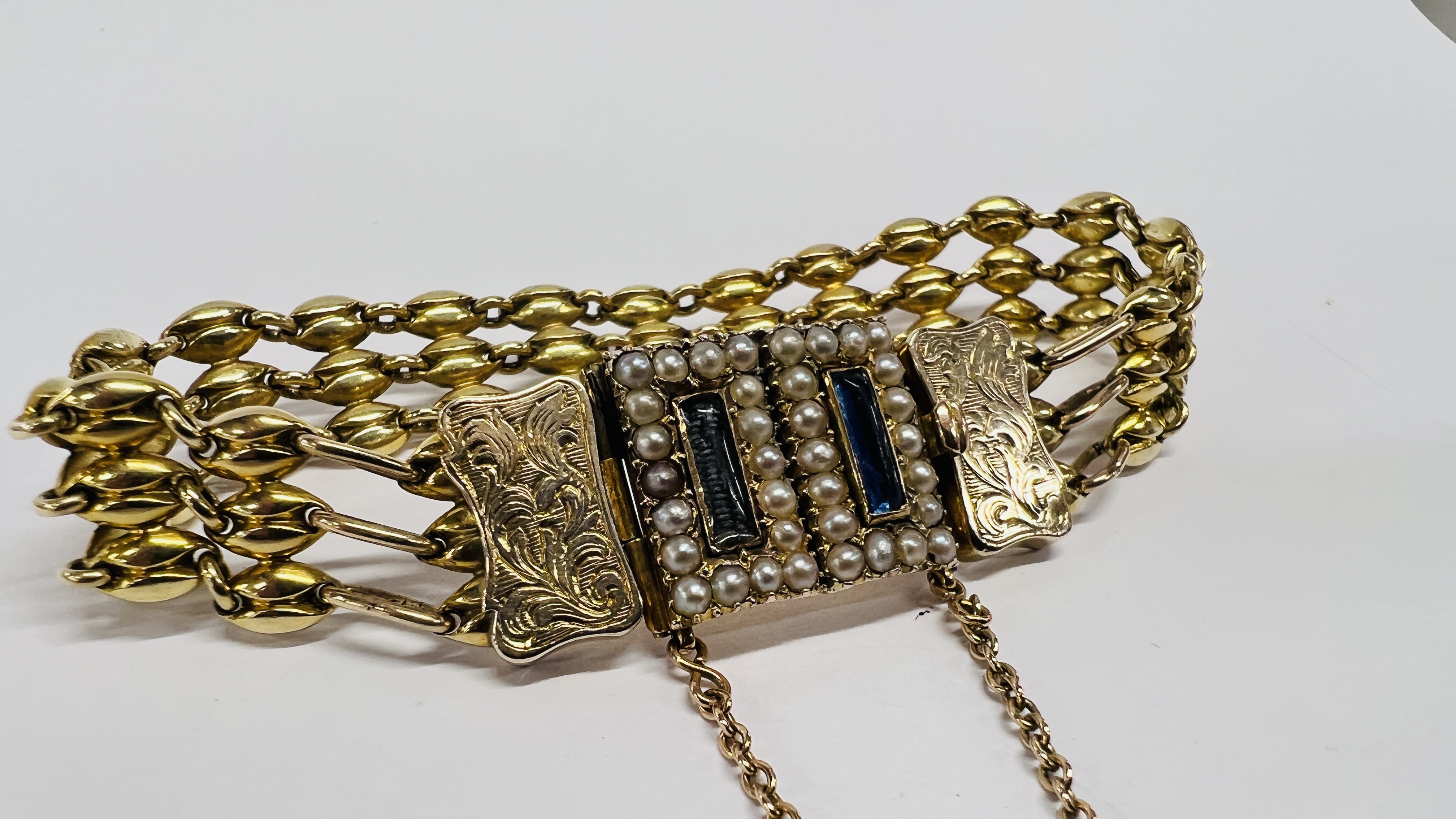 AN EDWARDIAN UNMARKED YELLOW METAL BRACELET, THE RECTANGULAR PANELS SURROUNDED BY SEED PEARLS, - Image 3 of 13