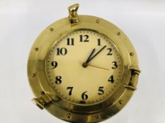 A REPRODUCTION BRASS SHIPS PORTHOLE WITH CLOCK FACE, D 29CM.