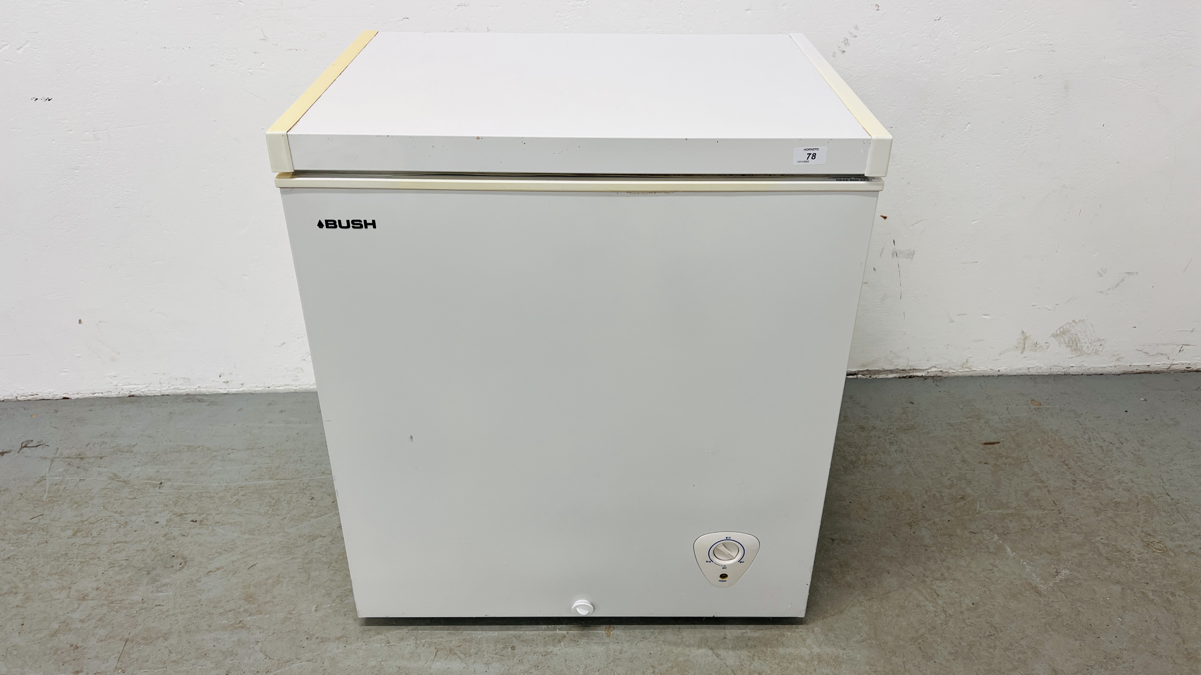 A BUSH CHEST FREEZER WIDTH 73CM. DEPTH 56CM. HEIGHT 83CM.