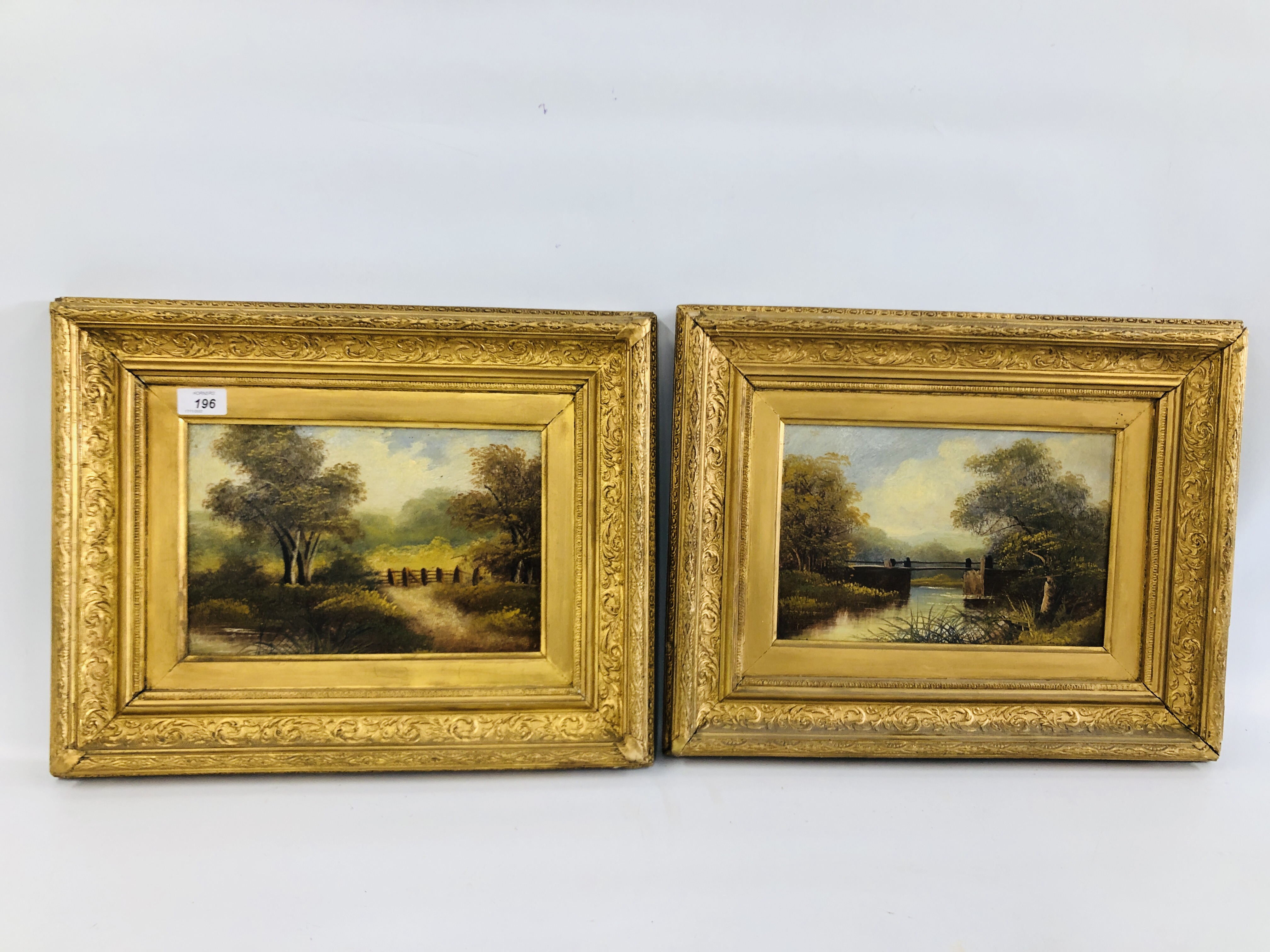 PAIR OF GILT FRAMED C19TH SCHOOL OIL ON BOARD, RIVER SCENE WITH BRIDGE AND A LANDSCAPE SCENE,