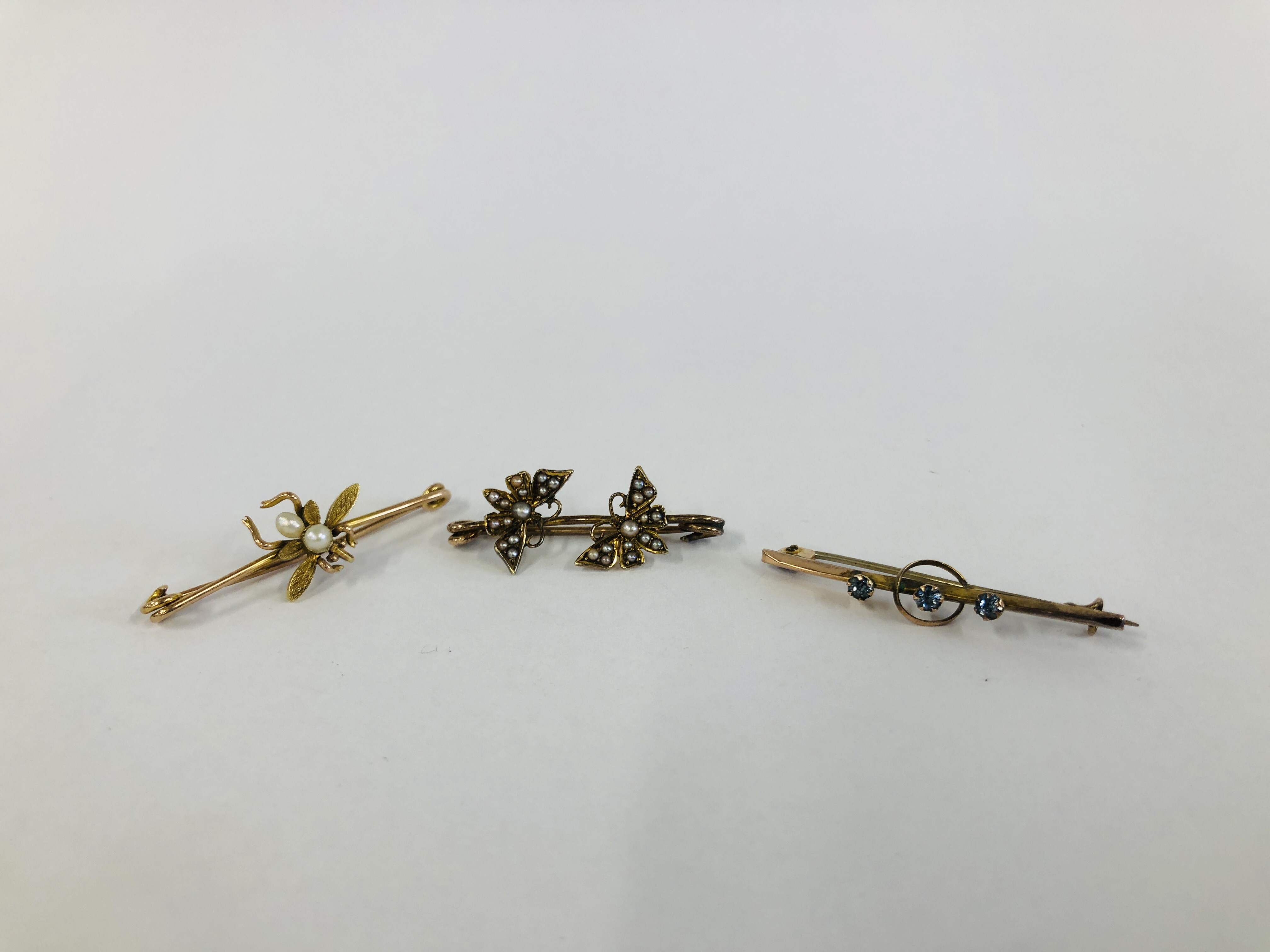 THREE VINTAGE YELLOW METAL BROOCHES SET WITH PEARLS AND SEED PEARLS,