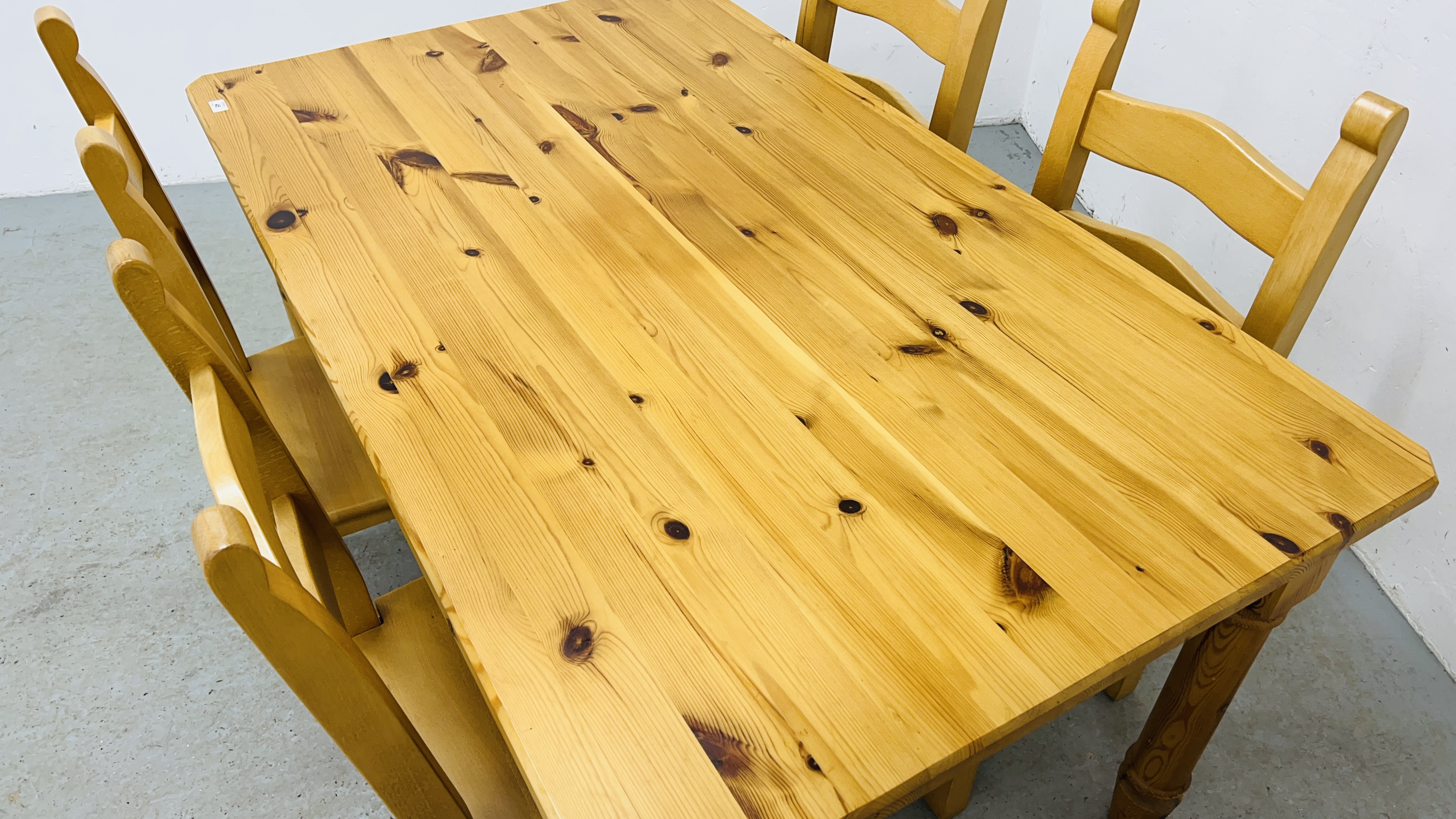 A SOLID NATURAL PINE RECTANGULAR DINING TABLE WITH CARVED DETAIL TO RAILS WIDTH 90CM. LENGTH 153CM. - Image 3 of 14