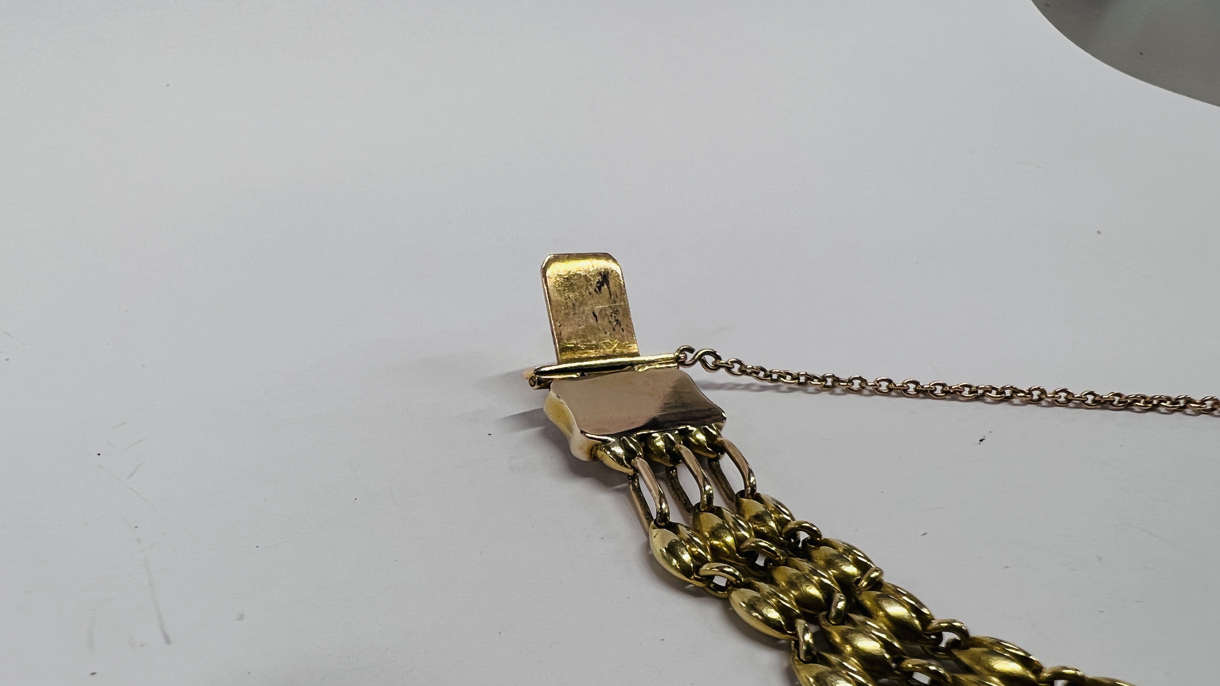 AN EDWARDIAN UNMARKED YELLOW METAL BRACELET, THE RECTANGULAR PANELS SURROUNDED BY SEED PEARLS, - Image 12 of 13