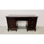 STAG SEVEN DRAWER DRESSING TABLE WIDTH 135CM. DEPTH 46CM. HEIGHT 71CM.