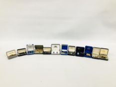 AN EXTENSIVE GROUP OF CUFF LINKS TO INCLUDE SILVER AND ENAMELLED EXAMPLES + A TIE CLIP IN GIFT BOX.