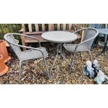 A METAL FRAMED GARDEN BISTRO SET THE CIRCULAR TABLE HAVING GLASS TOP (TABLE PLUS 2 CHAIRS)