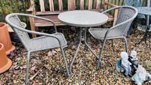 A METAL FRAMED GARDEN BISTRO SET THE CIRCULAR TABLE HAVING GLASS TOP (TABLE PLUS 2 CHAIRS)