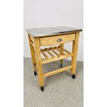 A MODERN SOLID BEECHWOOD FRAMED CHEFS WORKSTATION ON CASTOR WHEELS WITH STAINLESS STEEL WORKTOP,