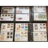 A COLLECTION OF GB FIRST DAY COVERS 1982-96 IN FOUR ALBUMS.