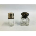 A SILVER MOUNTED GLASS INKWELL, CHESTER 1928 (CORNER CHIP),