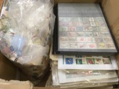 LARGE BOX WITH FOREIGN STAMPS ON STOCKCARDS ARRANGED BY COUNTRY, EGYPT, IRAQ,