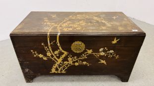 A VINTAGE CAMPHOR WOOD CHEST WITH ORIENTAL GILT INLAY WIDTH 104CM. DEPTH 54CM. HEIGHT 57CM.