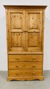 MODERN WAXED PINE TWO DOOR THREE DRAWER TALLBOY WIDTH 102CM. DEPTH 56CM. HEIGHT 190CM.