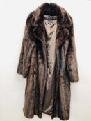 A LADIES DENNIS BASSO FAUX FUR COAT SIZE XXL.