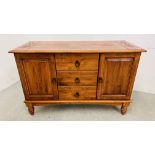 A HARDWOOD TWO DOOR DRESSER BASE WITH THREE CENTRAL DRAWERS WIDTH 122CM. DEPTH 49CM. HEIGHT 79CM.