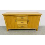 A SOLID OAK THREE DRAWER TWO DOOR SIDEBOARD WIDTH 137CM. DEPTH 45CM. HEIGHT 75CM.