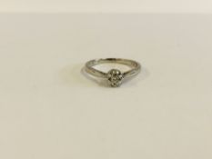 A PLATINUM SOLITAIRE DIAMOND SET RING.