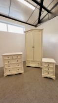 A JULIAN BOWEN THREE PIECE CREAM FINISH BEDROOM SUITE COMPRISING OF A DOUBLE WARDROBE WITH DRAWER