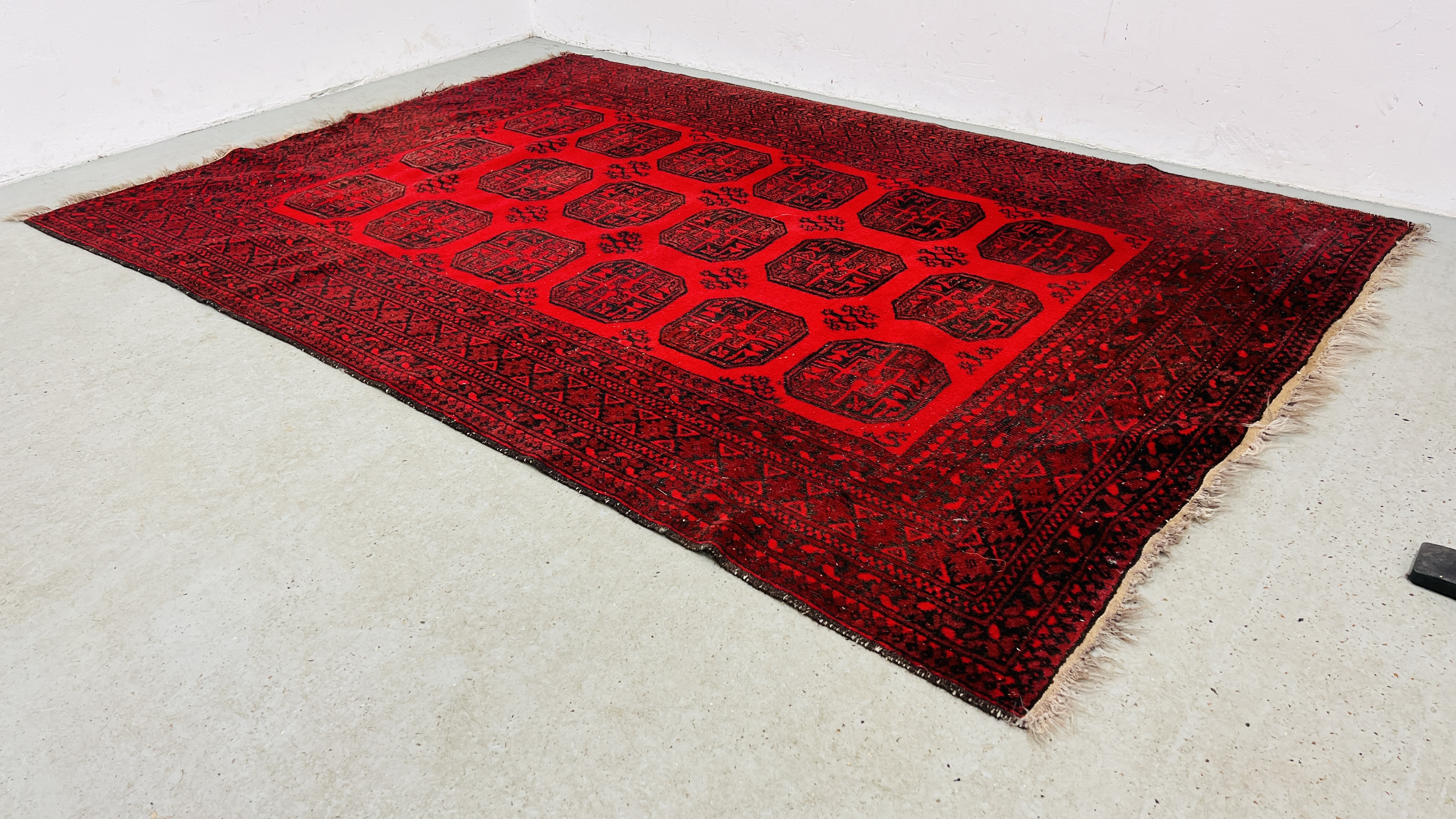 A BALUCH RUG OF TYPICAL DESIGN 285CM. X 201CM.