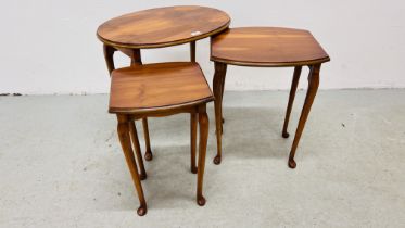 A NEST OF MODERN YEW FINISH OCCASIONAL TABLES HEIGHT 53CM.