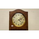 A GERMAN 1930's OAK CASED LONG CASE CLOCK WITH WESTMINSTER CHIME.