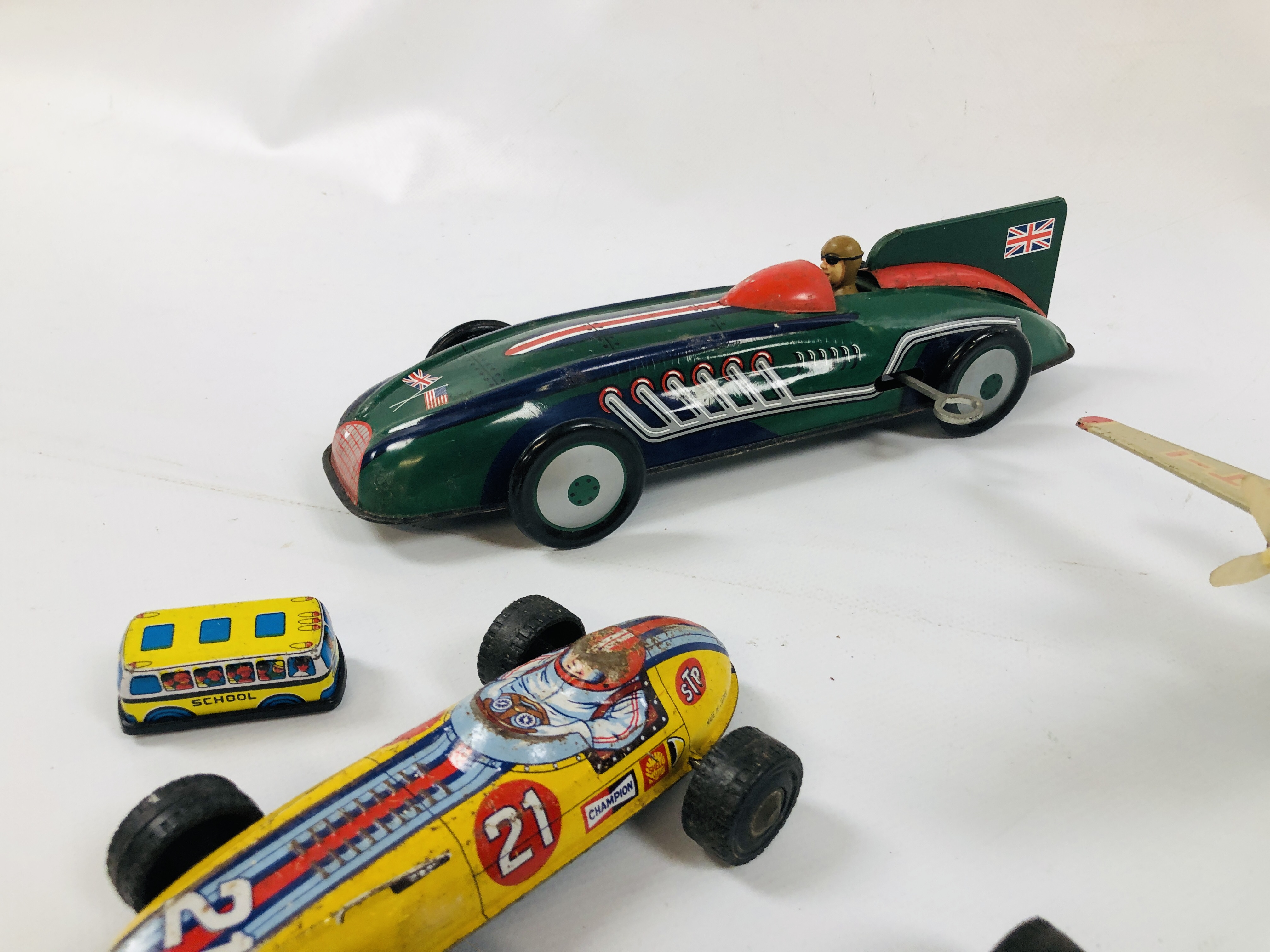 A GROUP OF VINTAGE TIN PLATE CARS, VEHICLES, TRAIN AND A PLANE INCLUDING STP CHAMPION 21, - Image 4 of 6
