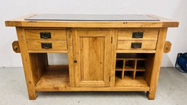 A SOLID OAK MARBLE TOPPED KITCHEN ISLAND WITH TWO SLIDE THROUGH DRAWERS AND SINGLE CENTRAL DOOR,