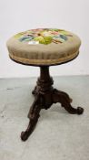 A VICTORIAN REVOLVING RISE AND FALL MUSIC STOOL,