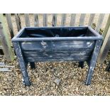 A RAISED RECLAIMED TROUGH STYLE PLANTER, W 97CM, D 45CM, H 77CM.