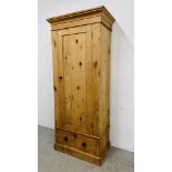 AN ANTIQUE WAXED PINE SINGLE DOOR ONE DRAWER WARDROBE, W 86CM, D 46CM, H 200CM.