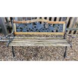 A DECORATIVE CAST METAL FRAMED GARDEN BENCH WITH SLATTED WOODEN SEAT AND ROSE DETAILING LENGTH
