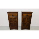 A PAIR OF GOOD QUALITY REPRODUCTION SINGLE DOOR SINGLE DRAWER CHESTS BY GRANGEMOOR