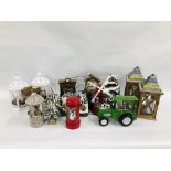 A BOX CONTAINING TWO PAIRS OF CHRISTMAS LANTERNS, WINTER SCENES AND SNOW GLOBES - SOLD AS SEEN.