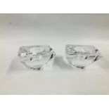 A PAIR OF TORNADO TEALIGHT HOLDERS BY JAN JOHANSSON HEIGHT 5.5CM. WIDTH 10CM.