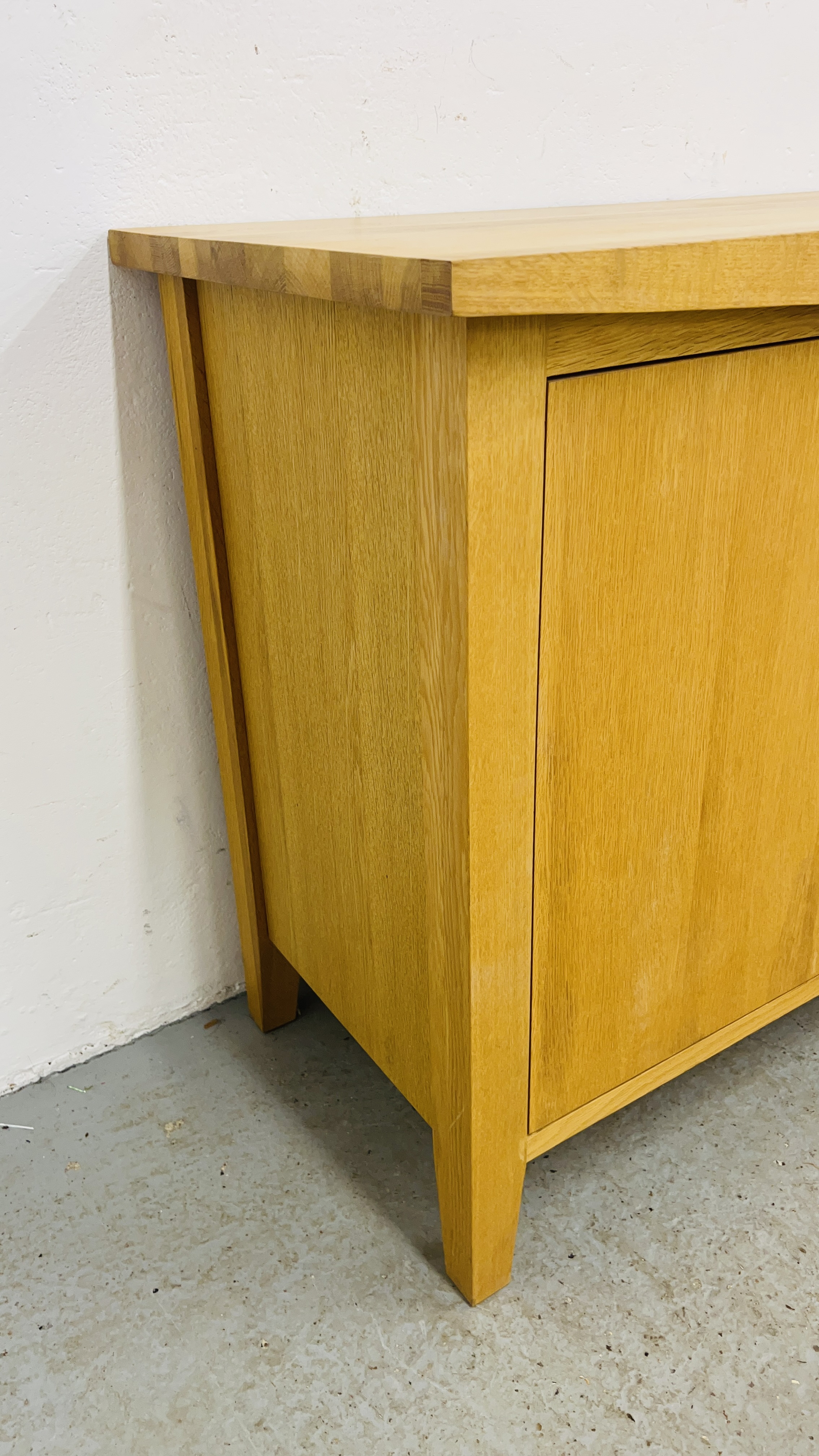 A SOLID OAK THREE DRAWER TWO DOOR SIDEBOARD WIDTH 137CM. DEPTH 45CM. HEIGHT 75CM. - Image 4 of 10