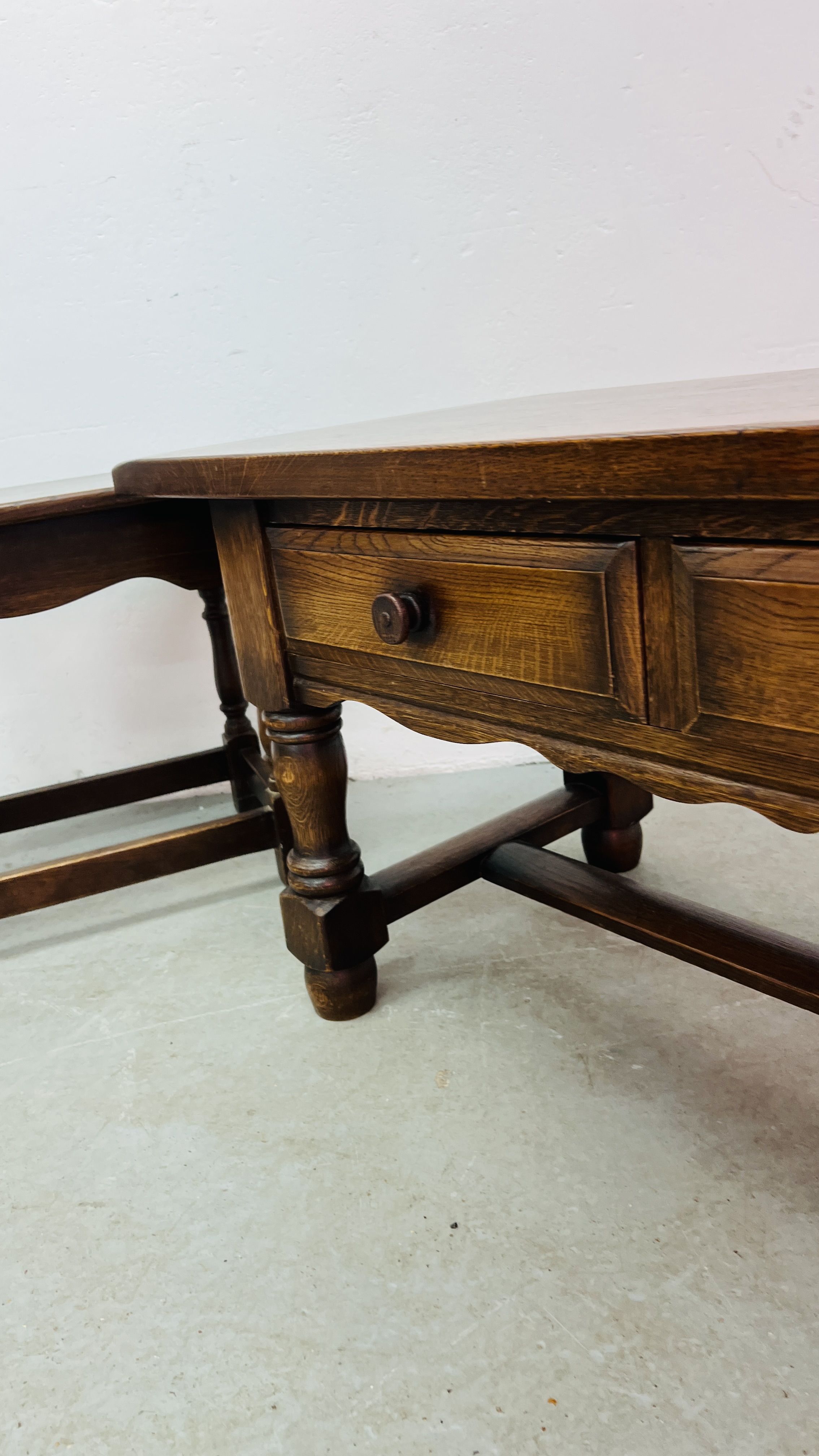 A NEST OF THREE OAK GRADUATED OCCASIONAL TABLES, RECTANGULAR TWO DRAWER OAK COFFEE TABLE WIDTH 49CM. - Image 5 of 12