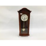 A REPRODUCTION WESTMINSTER CHIMING FENCLOCKS SUFFOLK WALL CLOCK WITH KEY AND PENDULUM.