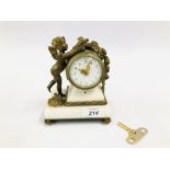 VINTAGE C19TH FRENCH GILDED ORMOLU AND WHITE MARBLE MANTEL CLOCK ON FOUR RAISED FEET ONE OF WHICH