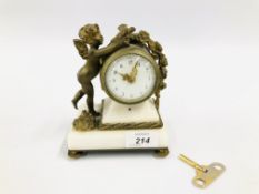 VINTAGE C19TH FRENCH GILDED ORMOLU AND WHITE MARBLE MANTEL CLOCK ON FOUR RAISED FEET ONE OF WHICH