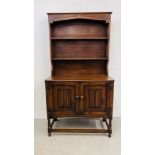 A SMALL OAK COTTAGE DRESSER WITH LINENFOLD DETAIL WIDTH 94CM. DEPTH 46CM. HEIGHT 176CM.