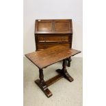 AN OAK TWO DRAWER WRITING BUREAU WIDTH 76CM. DEPTH 47CM. HEIGHT 96CM.