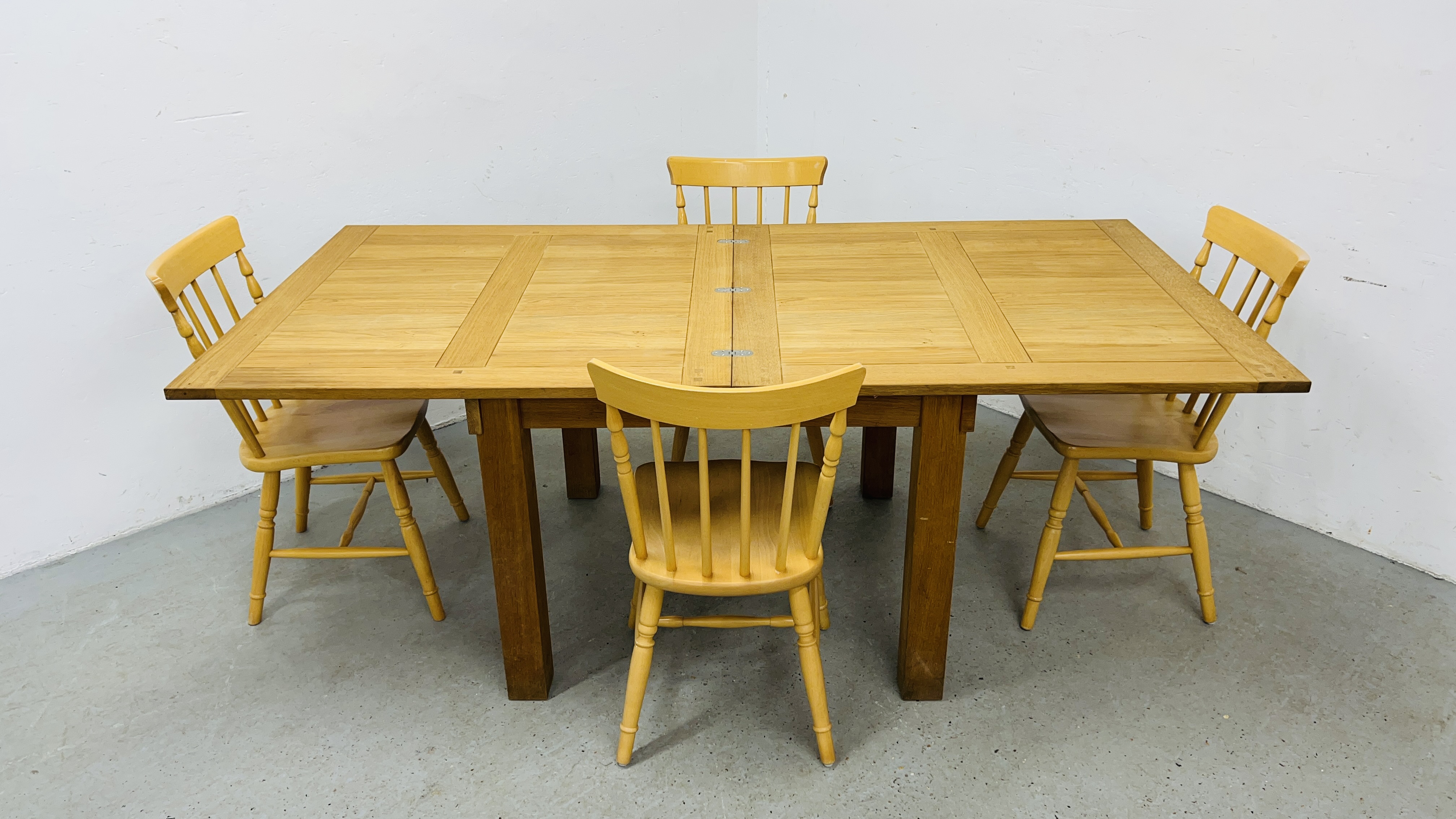 A SOLID OAK EXTENDING DINING TABLE ALONG WITH A SET OF FOUR BEECH WOOD DINING CHAIRS - Image 14 of 14