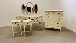 A CONTINENTAL STYLE CREAM FINISH KIDNEY SHAPED DRESSING TABLE WITH APPLIED DETAIL AND TRIPLE VANITY