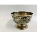 A FOOTED CIRCULAR SILVER BOWL DECORATED VINES AND FERNS, LONDON ASSAY HEIGHT 8.5CM. DIA. 11.7CM.