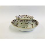 AN C18TH NEWHALL PINK RIBBON PORCELAIN TEABOWL AND SAUCER.