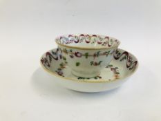 AN C18TH NEWHALL PINK RIBBON PORCELAIN TEABOWL AND SAUCER.